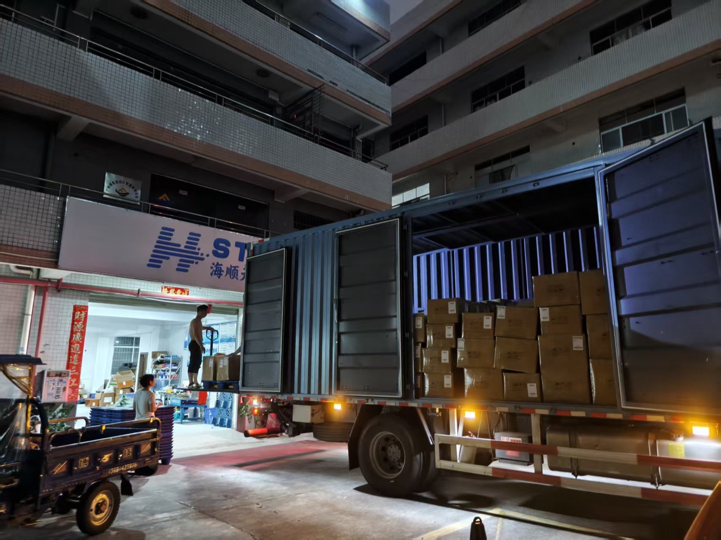 Cartons being loaded into a freight truck at Haishun in Guangzhou