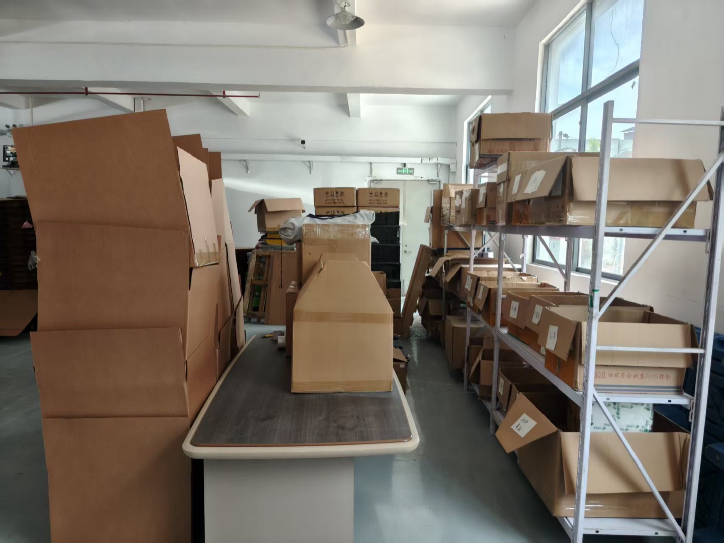 Cartons and worktable in the Haishun packing area