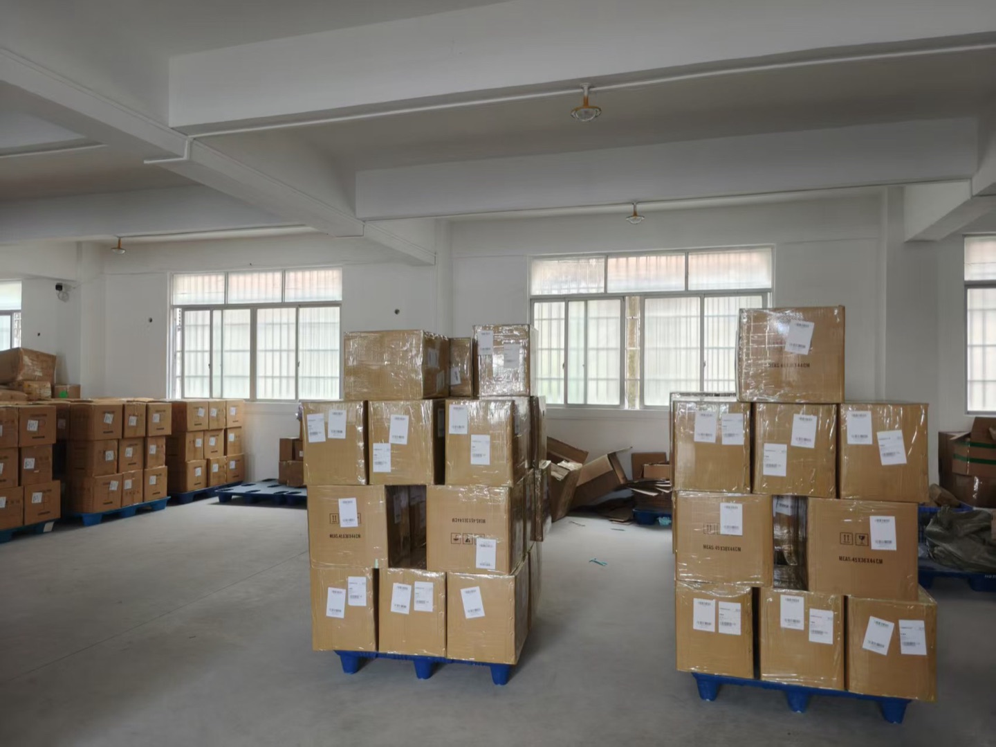 Wrapped cartons on pallets ready for receiving